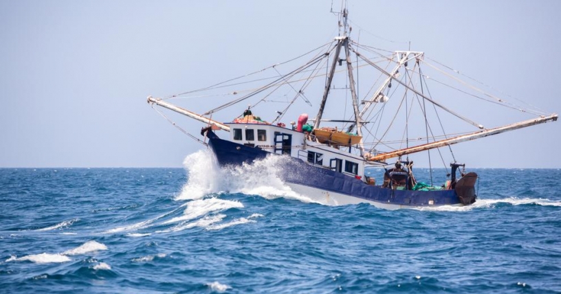 Fishing vessel operating on the open ocean